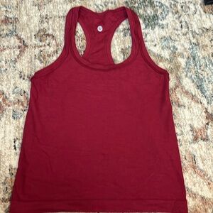 size small excellent condition maroon in color